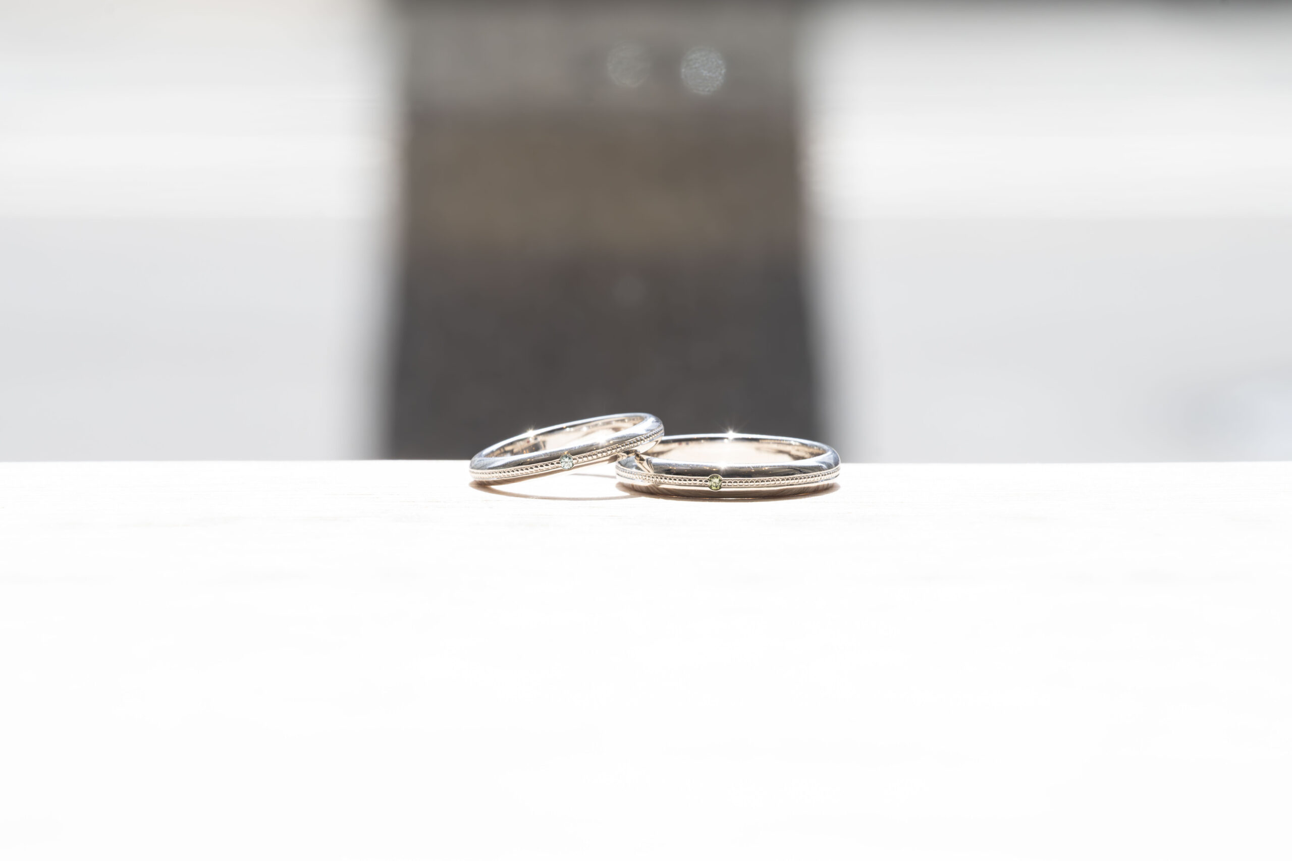 ペアリング（彫金工法）アクアマリンペリドット伏込み留めミル打ち