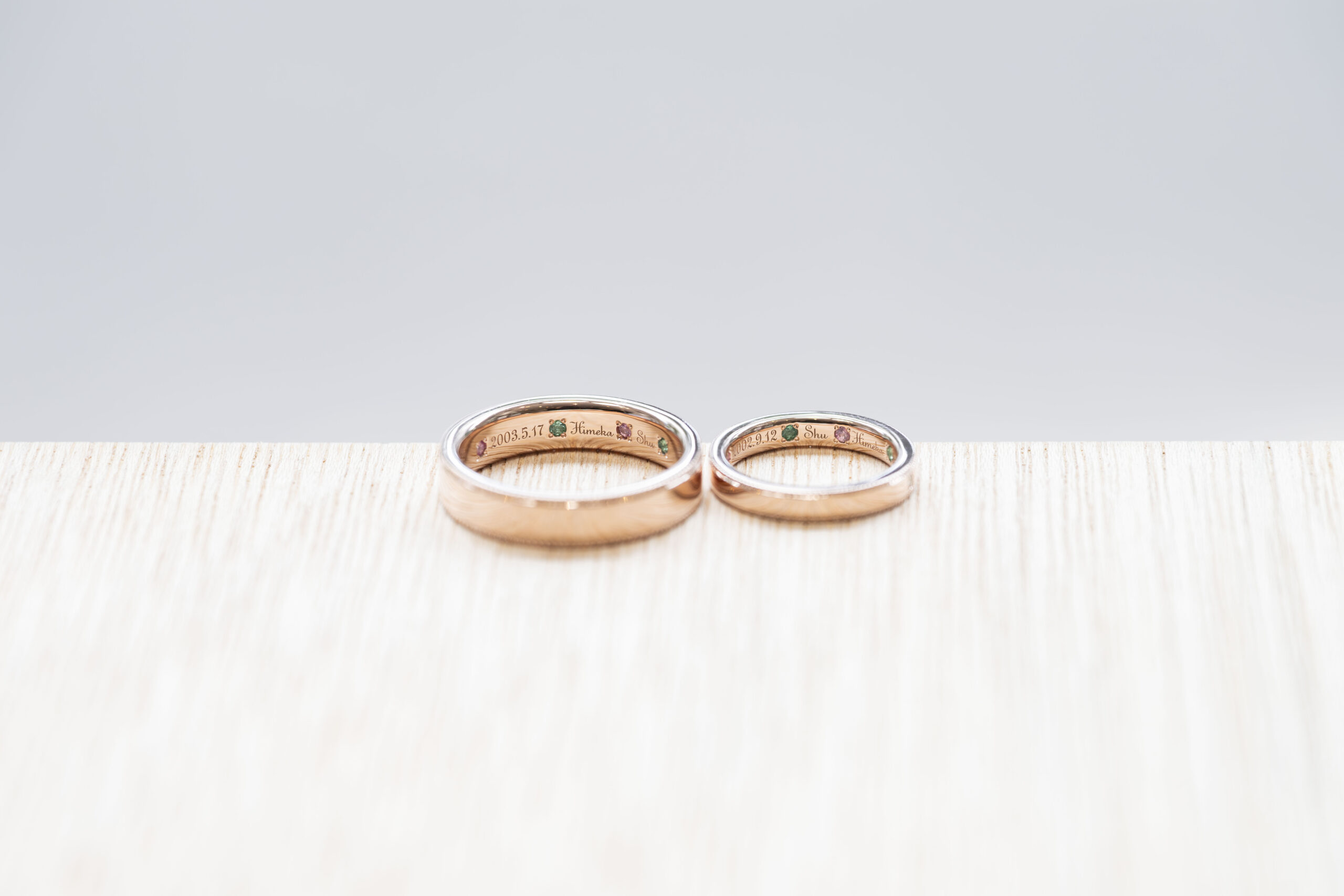 ペアリング（WAX工法）エメラルドサファイアダイヤモンドななこ留め鏡面